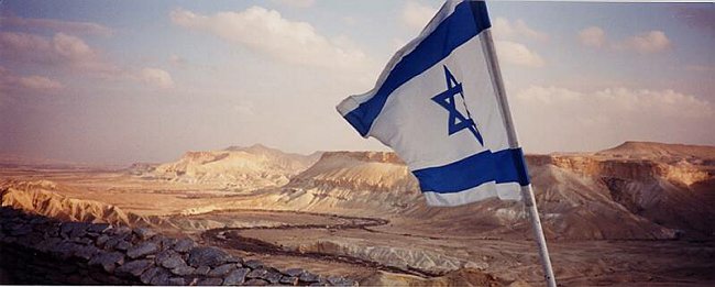 Flag flying high over the Negev Desert at Ben Gurion's Tomb