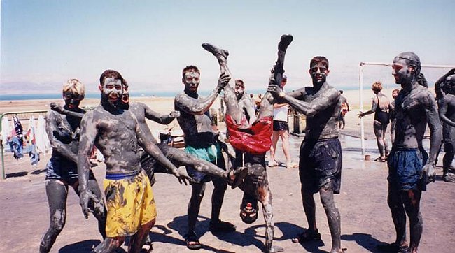 Letting the mud dry on all ends at the Dead Sea